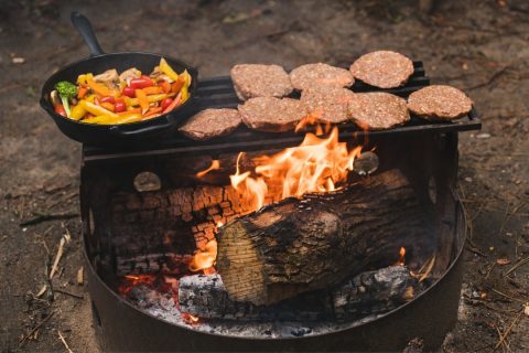 A campfire meal being prepared